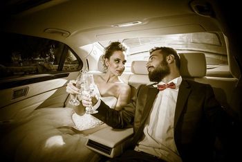 The newlyweds in the limousine
